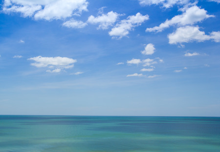 sea and blue sky in summer at Hua HIn beach, Thailandの写真素材
