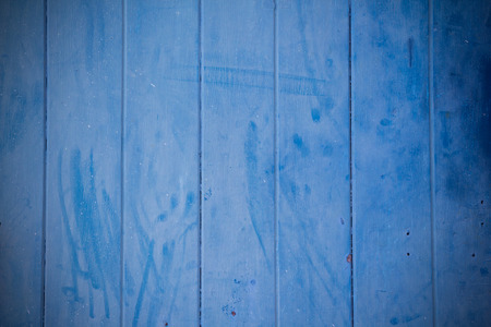 blue wooden background and texture with dark vignette, blue grunge timber panelの写真素材
