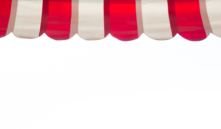 red and white stripe awning isolate on white backgroundの写真素材