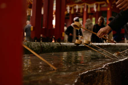 Japanese people pray at the Shinto shrine in Kyoto, Japan.の写真素材