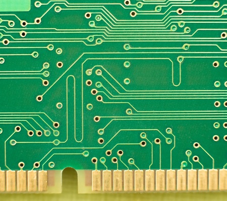 macro of green circuit board with external contacts