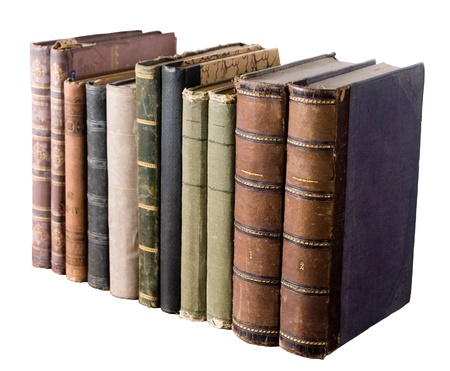 isolated row of antique books on white backgroundの写真素材