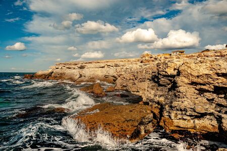 Crimea deserted rocky coast washed by the waters of the Black Sea. Natural stocks of lamb.の写真素材