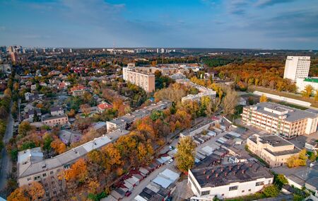 Aerial view of a large developing European city with high-rise buildings, roads and new buildings....