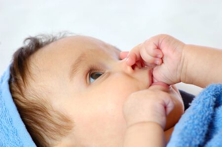 Close-up of a little four month old girlの写真素材