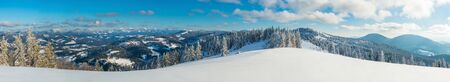Top view of a beautiful mesmerizing view of the ski slope with ski trails located in the mountains...