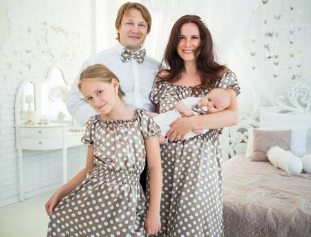 Portrait of a beautiful and young familyの写真素材