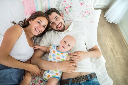 Top view of a happy young familyの写真素材