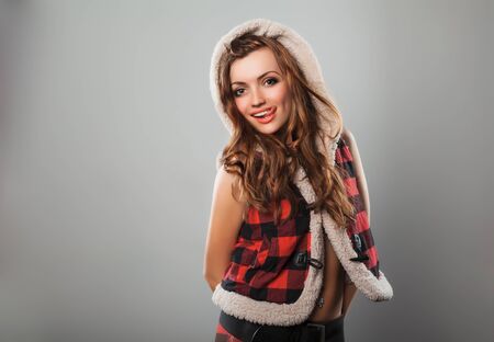 Attractive woman keeping hand in pockets.の写真素材