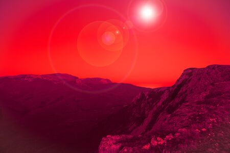 Mesmerizing picturesque mountain landscape with a full moon at night. Concept of pristine nature and...