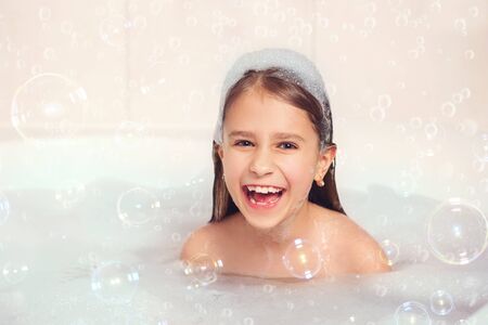 Games with white and fluffy foamの写真素材