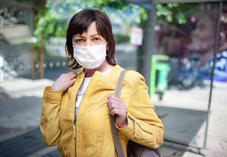 Portrait of an unidentified young woman in a maskの写真素材