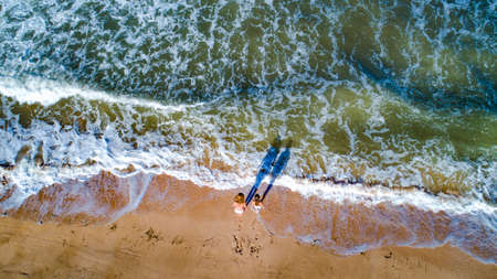 Walk along the seashoreの写真素材
