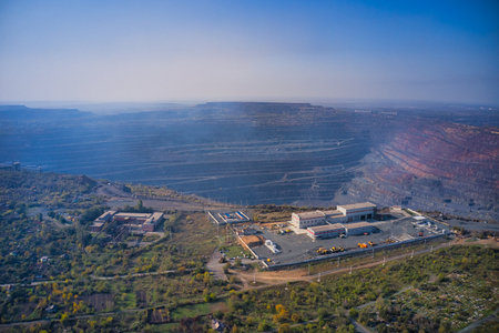 Management building near a huge quarry. Southern mining factory in Ukraine.