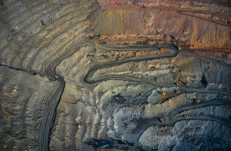 Extraction of minerals with the help of special equipment in the warm evening light in picturesque...