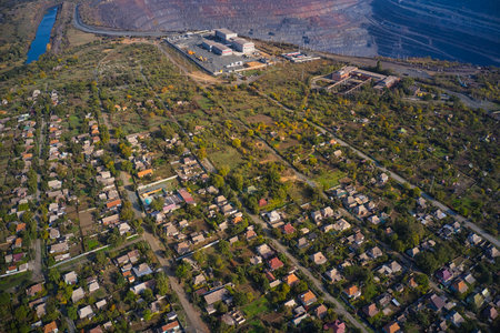 Management building near a huge quarry. Southern mining factory in Ukraine.