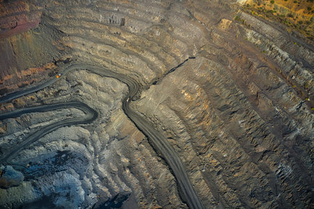 Extraction of minerals with the help of special equipment in the warm evening light in picturesque...