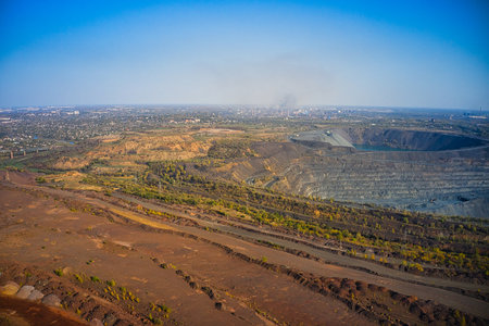 Extraction of minerals with the help of special equipment in the warm evening light in picturesque...