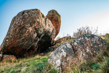 Huge deposits of stone minerals in a clearing bathed in warm sun in picturesque Ukraine