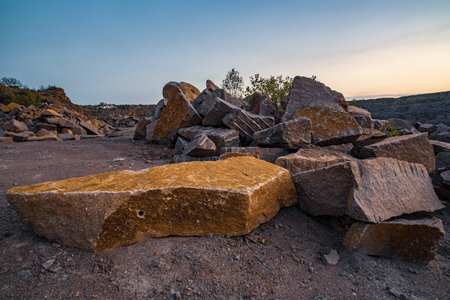 Large deposits of stone materials near a mining quarryの写真素材
