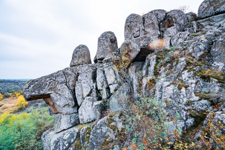 Aktovsky Canyon, Ukraine. Autumn trees and large stone boulders aroundの写真素材