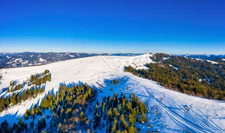 Magical winter panorama of beautiful snowy slopesの写真素材