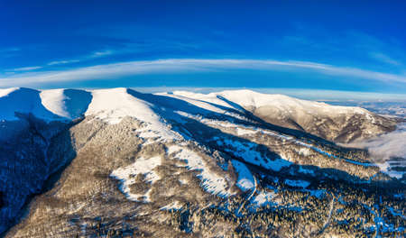 Aerial view of beautiful winter mountain slopesの写真素材