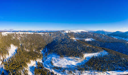 Aerial view of beautiful winter mountain slopesの写真素材
