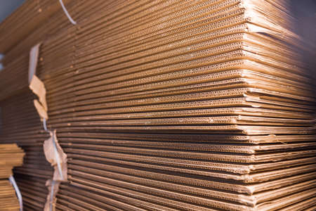Close-up large cardboard piles lie on topの写真素材