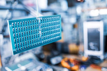 Close-up side view of a panel of SMD resistorsの写真素材