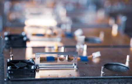 Metal boards and accessories lie on the surface