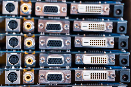 Close-up blurry metal sockets on a computer video boardの写真素材