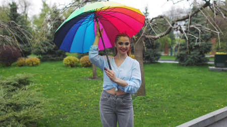 A cute girl with multi-colored braids and bright makeupの写真素材