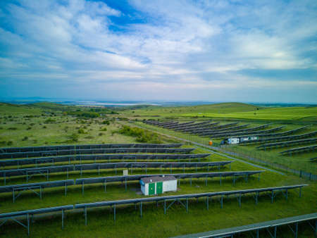 Modern eco-friendly large solar panels to generate energy from sun's rays are installed in endless...