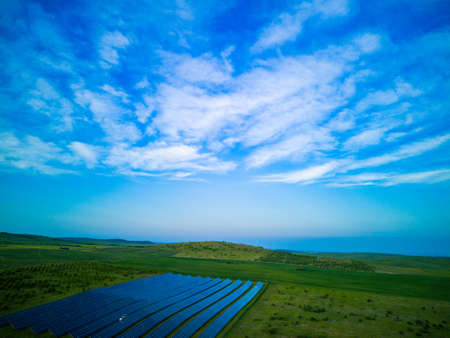 Modern eco-friendly large solar panels to generate energy from sun's rays are installed in endless...