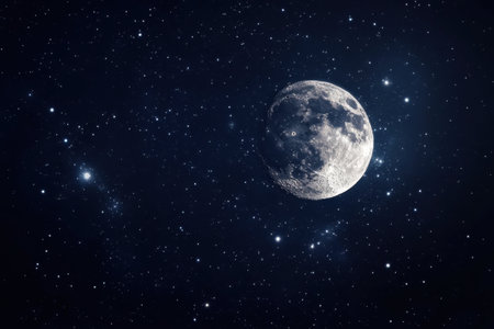 A stunning full moon illuminates the night sky, surrounded by countless twinkling stars, creating a serene atmosphere.の写真素材