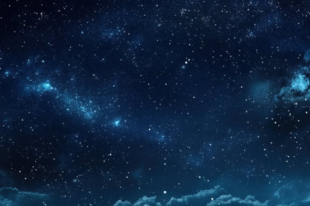 A brilliant display of stars illuminates the night sky, creating a tranquil atmosphere at twilight.の写真素材