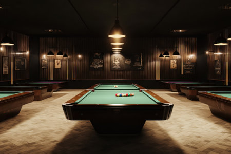Several billiard tables are set up in a cozy game room featuring warm lighting and vintage decor.の写真素材