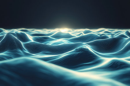 Gentle waves undulate on the ocean's surface, glowing softly under the fading light of sunset in the distance.の写真素材