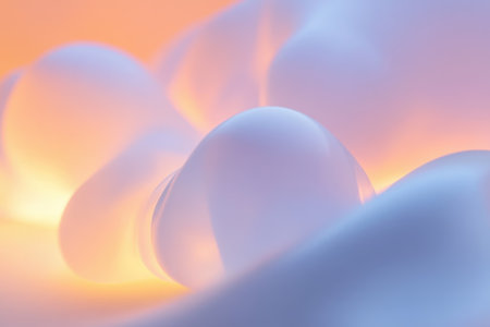 Wispy clouds illuminated by a soft glow enhance the serene ambiance of the evening sky.の写真素材