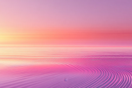 A stunning sunset casts vibrant pink and orange hues across tranquil water, creating a serene atmosphere.の写真素材