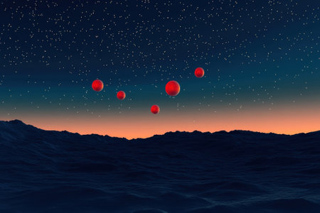 Five red balloons drift against a darkening sky filled with stars as twilight approaches over mountain silhouettes.の写真素材
