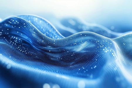 Swirling blue waves with shining particles evoke a serene digital world of beauty and depth.の写真素材