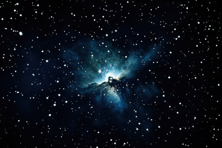 A vibrant nebula glows amidst a sea of stars, showcasing the wonders of deep space and cosmic beauty.の写真素材