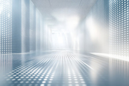 A long corridor with illuminated surfaces and dotted patterns presents a futuristic and spacious feel.の写真素材