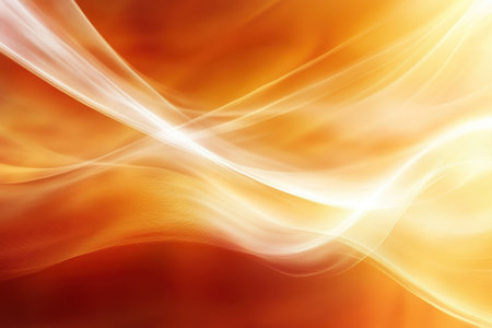 Soft, flowing lines in shades of orange and gold merge to form a vibrant abstract background.の写真素材