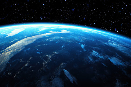Earth glows against the black backdrop of space, highlighting the blue oceans and white clouds.の写真素材