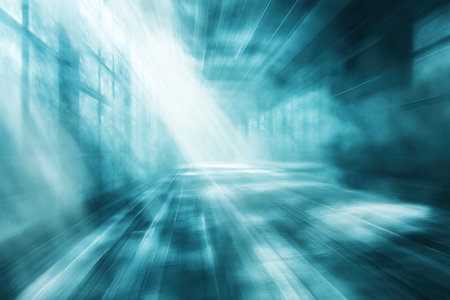 A foggy corridor in an abandoned location is illuminated by soft rays of light, creating an eerie atmosphere.の写真素材