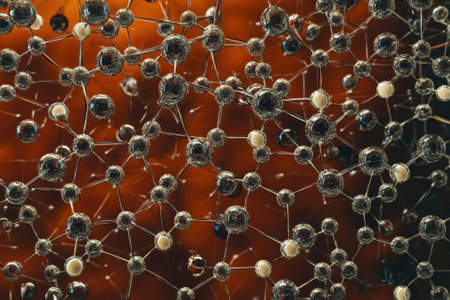 Close-up view of a complex molecular network displaying interconnected atoms and bonds with a soft glow.の写真素材
