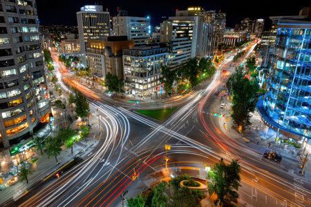 A high angle view of a busy city intersection at nightの写真素材